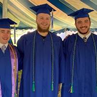 Smiling students celebrating graduation
